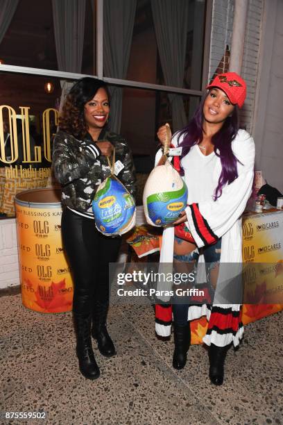 Kandi Burruss and Rasheeda attend Kandi Cares Foundation Thanksgiving Blessings Collection Day Food Drive at Old Lady Gang on November 17, 2017 in...