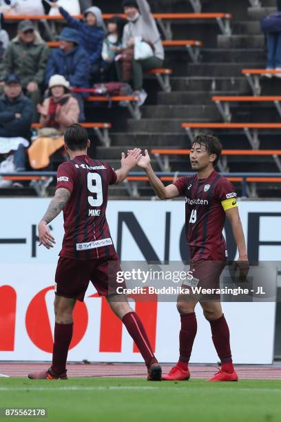 Kazuma Watanabe of Vissel Kobe celebrates scoring hi side's first goal with his team mate Mike Havenaar during the J.League J1 match between Vissel...