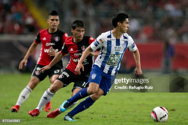 Matias Alustiza of Atlas fights for the ball with Erick Aguirre of Pachuca during the 17th round match between Atlas and Pachuca as part of the...