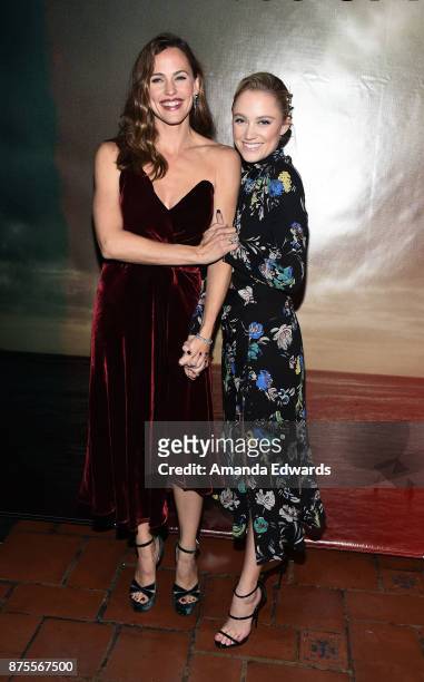Actresses Jennifer Garner and Maika Monroe arrive at the premiere of IFC Films' "The Tribes Of Palos Verdes" at The Theatre at Ace Hotel on November...