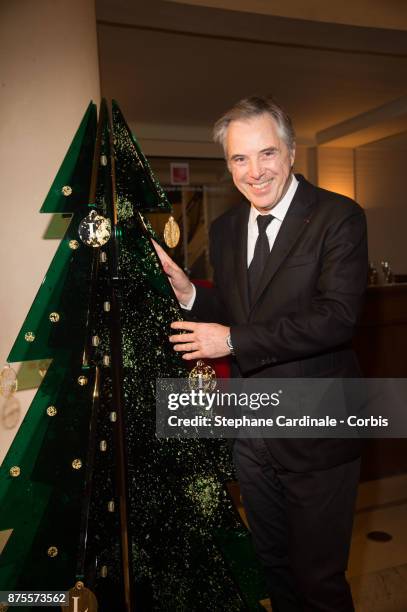 Olivier Lapidus poses with his Chrismas Tree during the 22th Edition Of 'Les Sapins De Noel Des Createurs - Designer's Christmas Trees on November...