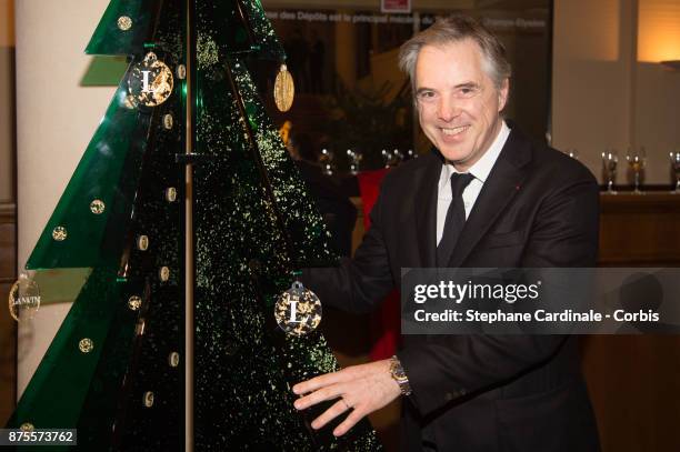 Olivier Lapidus poses with his Chrismas Tree during the 22th Edition Of 'Les Sapins De Noel Des Createurs - Designer's Christmas Trees on November...