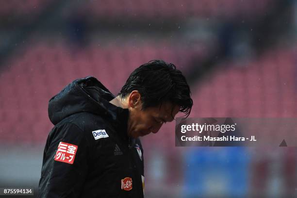 Kisho Yano of Albirex Niigata shows dejection after his team's relegation to the J2 despite their 1-0 victory in the J.League J1 match between...
