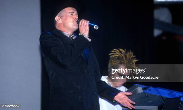 Neil Tennant and Chris Lowe of the Pet Shop Boys perform on stage at Glastonbury Festival, 24th June 2000 .