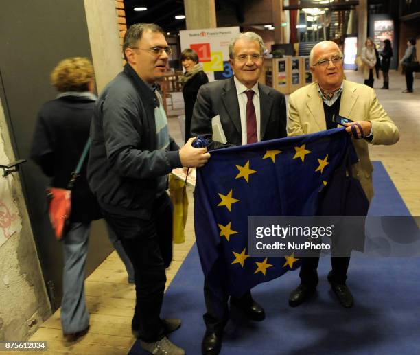 Romano Prodi Italian economist, academic and political along with a fan with the European flag after the conference Italy coming#1. Generations in...