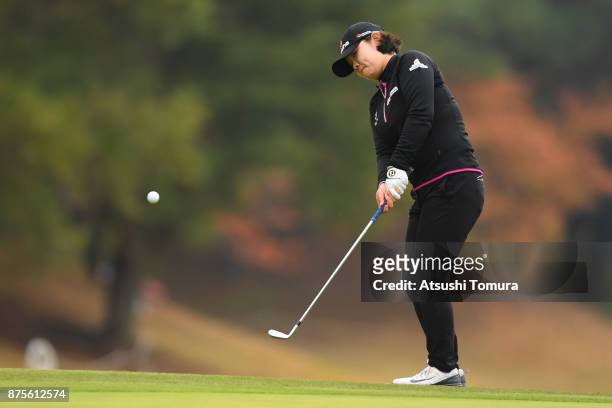 Min-Young Lee of South Korea chips onto the 18th green during the third round of the Daio Paper Elleair Ladies Open 2017 at the Elleair Golf Club on...