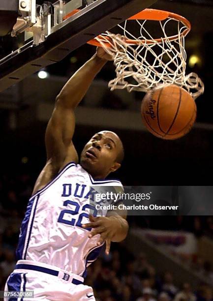 Duke University's Jason Williams dunks during the first half of the NCAA East Regional Final against USC on March 24 in Philadelphia.