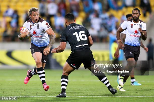 Ashton Sims of Fiji runs at Isaac Liu of the Kiwis during the 2017 Rugby League World Cup Quarter Final match between New Zealand and Fiji at...