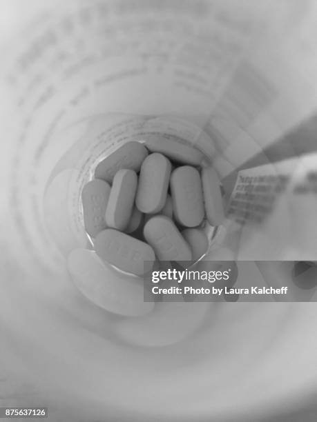 pill popping pov - chantilly virginia stock pictures, royalty-free photos & images