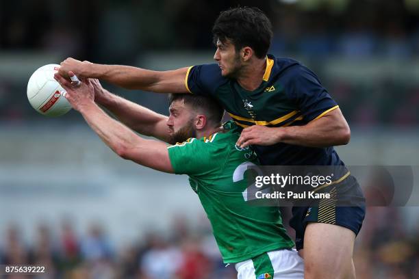 Robbie Tarrant of Australia spoils the mark for Aidan O'Shea of Ireland during game two of the International Rules Series between Australia and...