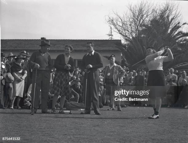 Little Patty Berg tees off in the golf tournament honoring the late Frank Condon, famous short story writer and golf enthusiast, at the San Gabriel...