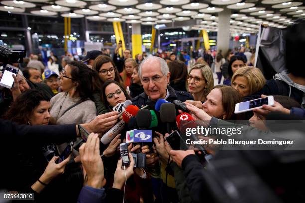 Former mayor of Caracas, Antonio Ledezma speaks to press at his arrival to Adolfo Suarez Madrid Barajas Airport on November 18, 2017 in Madrid,...