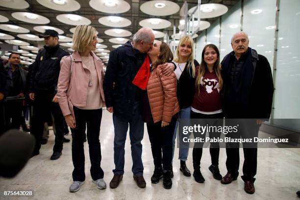 Former mayor of Caracas, Antonio Ledezma kisses his wife Mitzy Capriles amid his family at his arrival to Adolfo Suarez Madrid Barajas Airport on...