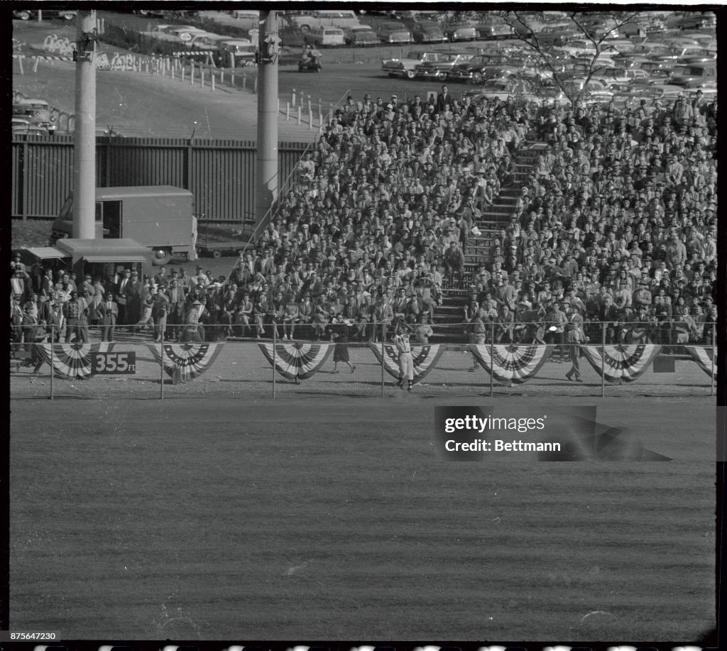 Wes Covington Leaping in Air to Catch Ball