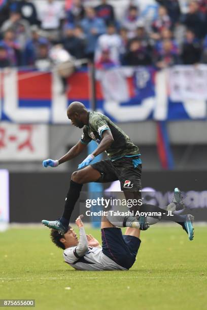 Victor Ibarbo of Sagan Tosu and Yuhei Tokunaga of FC Tokyo compete for the ball during the J.League J1 match between Sagan Tosu and FC Tokyo at Best...