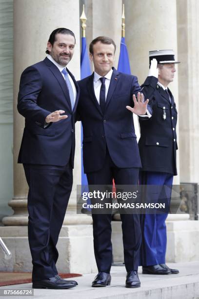 French President Emmanuel Macron welcomes Lebanese Prime Minister Saad Hariri at the Elysee Presidential Palace on November 18, 2017 in Paris. -...