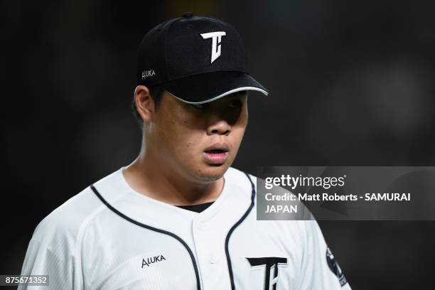 Pitcher Lin Cheng-Hsien of Chinese Taipei shows dejection after allowing two run single to Infielder Yota Kyoda of Japan in the top of fifth inning...