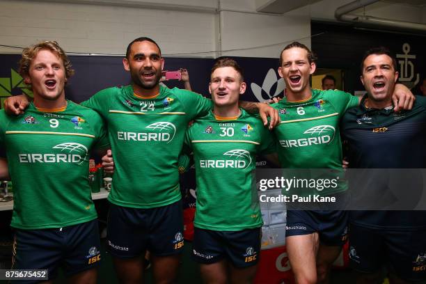 Rory Sloane, Shaun Burgoyne, Rory Laird, Nathan Fyfe and Chris Scott, coach of Australia sing the Australian National ANthem after winning game two...