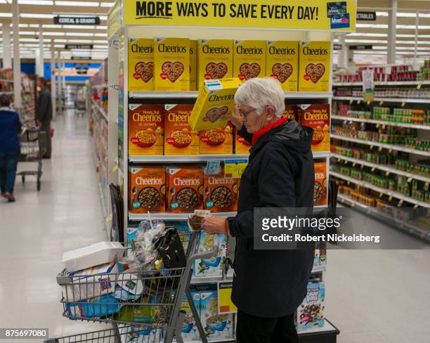 Woman shops for Cheerios cereal at a Price Chopper supermarket in South Burlington, Vermont, November 6, 2017. Price Chopper is a chain of...