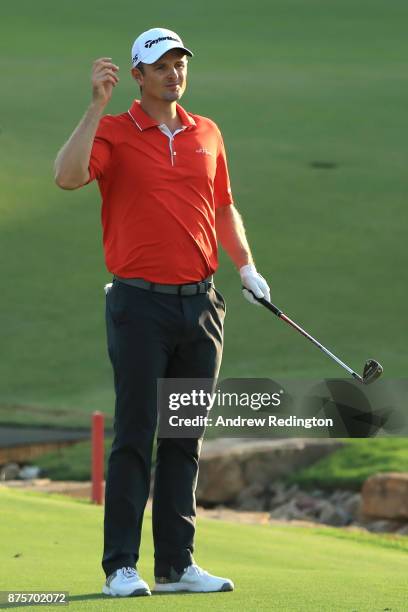 Justin Rose of England reacts on the 18th hole during the third round of the DP World Tour Championship at Jumeirah Golf Estates on November 18, 2017...