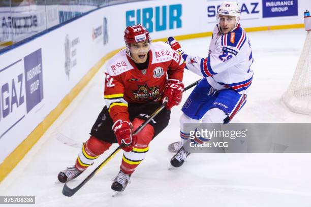 Brayden Jaw of HC Kunlun Red Star and Ilya Kablukov of SKA Saint Petersburg vie for the puck during the 2017/18 Kontinental Hockey League Regular...