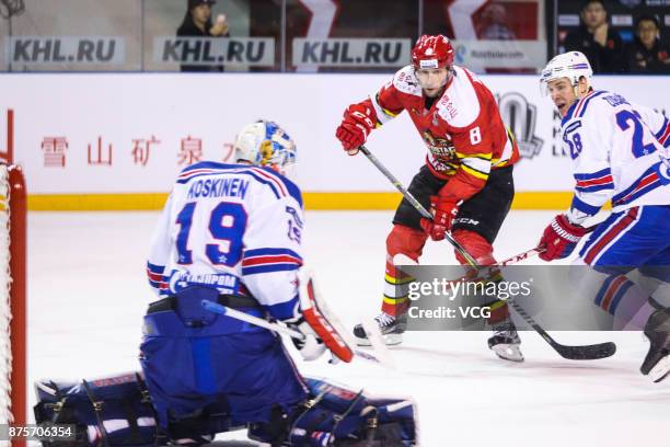 Wojtek Wolski of HC Kunlun Red Star and Andrei Zubarev of SKA Saint Petersburg vie for the puck during the 2017/18 Kontinental Hockey League Regular...