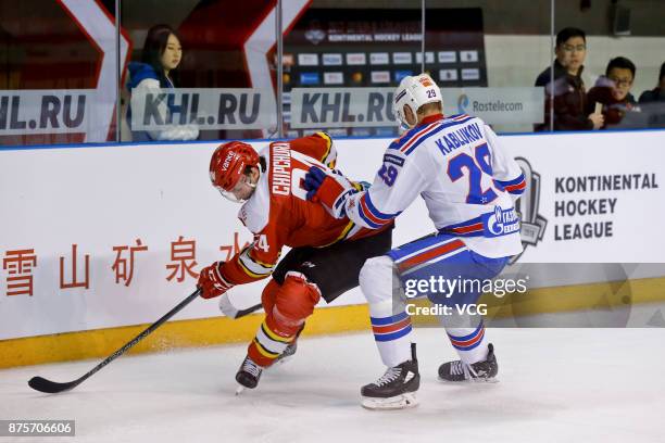 Kyle Chipchura of HC Kunlun Red Star and Ilya Kablukov of SKA Saint Petersburg vie for the puck during the 2017/18 Kontinental Hockey League Regular...