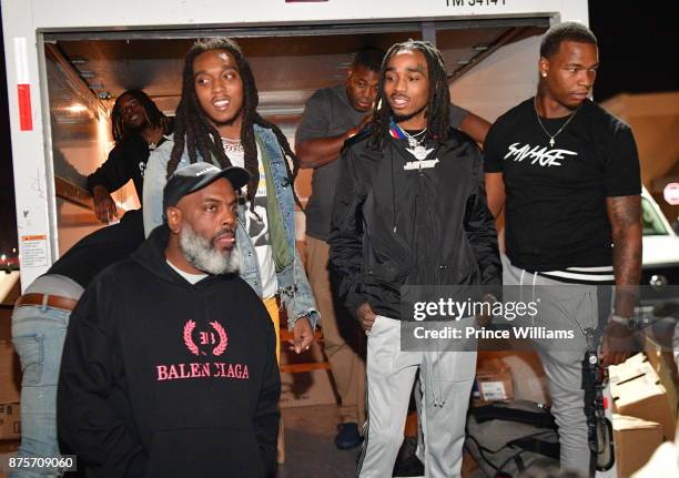 Kevin 'Coach K' Lee, Takeoff and Quavo of The Group Migos attends The Migos Turkey Drive at 799 Hutchins Road on November 17, 2017 in Atlanta,...