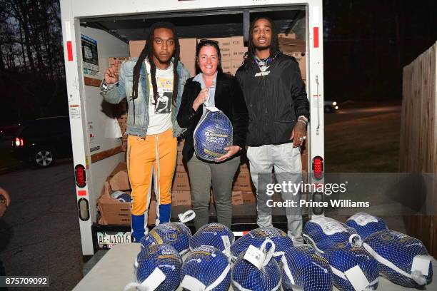 Takeoff and Quavo of the Group Migos hand out Turkeys at The Migos Turkey Drive at 799 Hutchins Road on November 17, 2017 in Atlanta, Georgia.