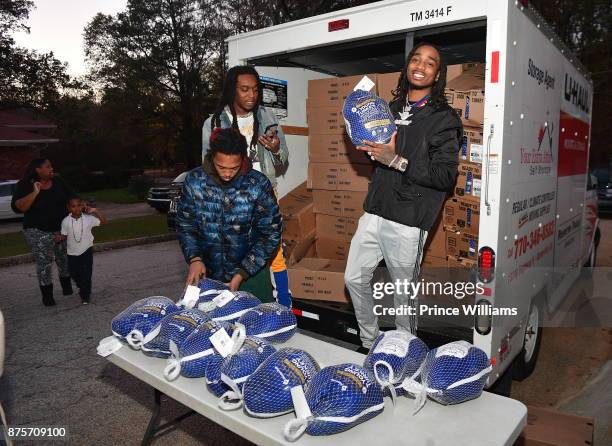 Takeoff and Quavo of the Group Migos hand out Turkeys at The Migos Turkey Drive at 799 Hutchins Road on November 17, 2017 in Atlanta, Georgia.