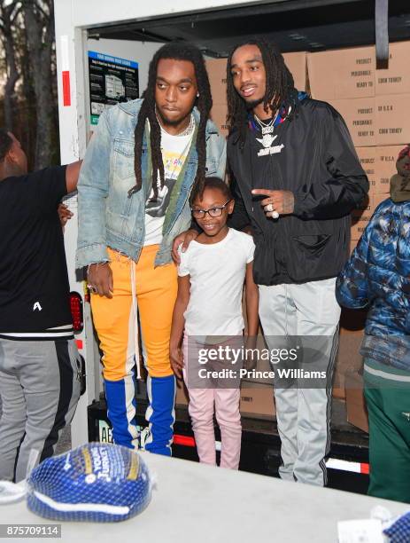 Takeoff and Quavo of the Group Migos hand out Turkeys at The Migos Turkey Drive at 799 Hutchins Road on November 17, 2017 in Atlanta, Georgia.