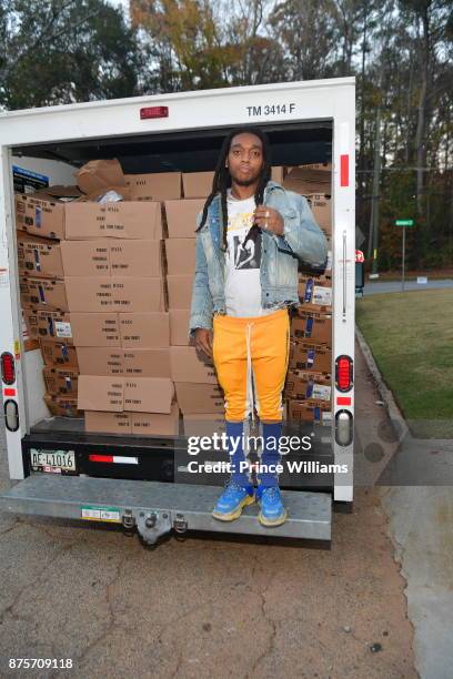 Takeoff Of The Group Migos attends The Migos Turkey Drive at 799 Hutchins Road on November 17, 2017 in Atlanta, Georgia.