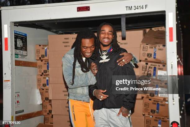 Takeoff and Quavo of the Group Migos hand out Turkeys at The Migos Turkey Drive at 799 Hutchins Road on November 17, 2017 in Atlanta, Georgia.