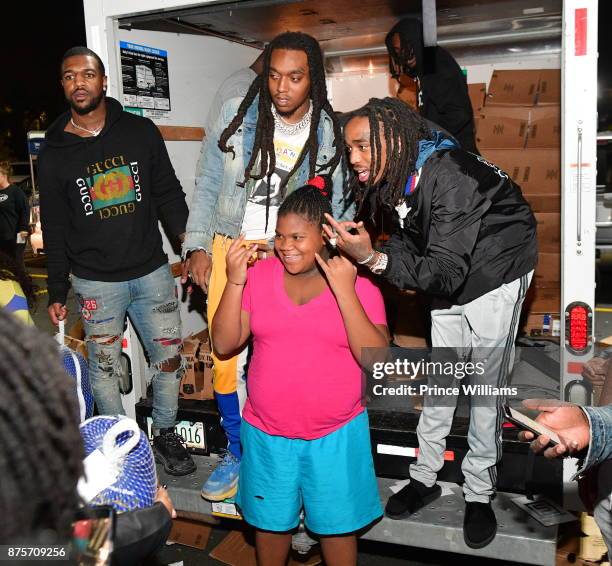 Takeoff and Quavo of The Migos attend The Migos Turkey Drive at 799 Hutchins Road on November 17, 2017 in Atlanta, Georgia.