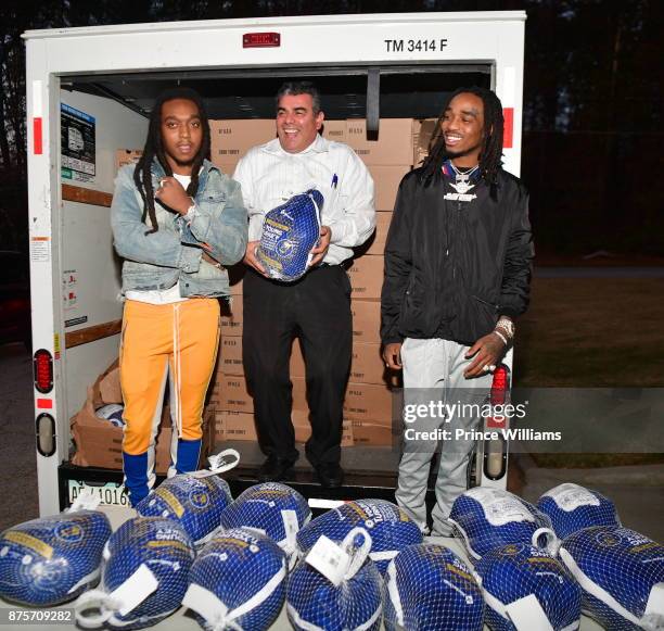 Takeoff and Quavo of The Migos attend The Migos Turkey Drive at 799 Hutchins Road on November 17, 2017 in Atlanta, Georgia.