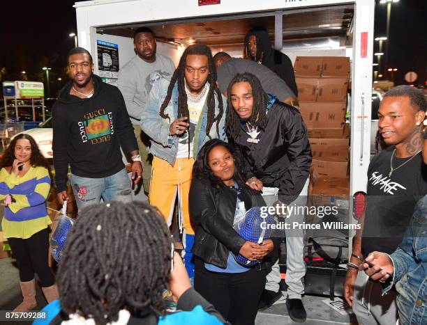 Takeoff and Quavo of The Migos attend The Migos Turkey Drive at 799 Hutchins Road on November 17, 2017 in Atlanta, Georgia.