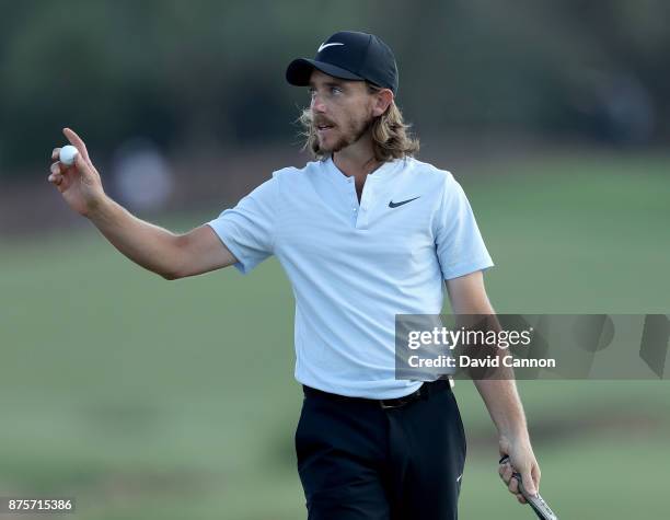 Tommy Fleetwood of England acknowledges the crowds after finishing his round on the 18th green during the third round of the 2017 DP World Tour...