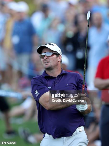 Ryan Fox of New Zealand plays his second shot on the 18th hole during the third round of the 2017 DP World Tour Championship on the Earth Course at...
