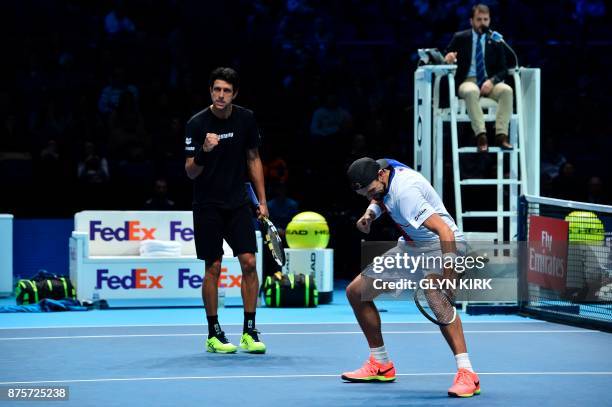 Brazil's Marcelo Melo and his partner Poland's Lukasz Kubot celebrate beating US player Ryan Harrison and New Zealand's Michael Venus during their...