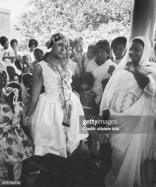 Sudan, women and girls dressed up, probably on the occasion of a wedding