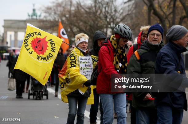 Activists march during a demonstration against nuclear weapons on November 18, 2017 in Berlin, Germany. About 700 demonstrators protested against the...