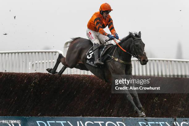 Tom Scudamore riding West Approach in action at Cheltenham racecourse on November 18, 2017 in Cheltenham, United Kingdom.