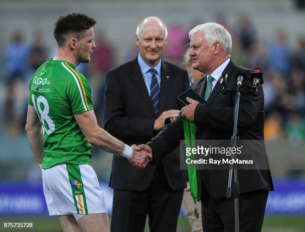 Perth , Australia - 18 November 2017; Uachtarán Chumann Lúthchleas Gael Aogán Ó Fearghail presents the 'Irish player of the series' award to Conor...