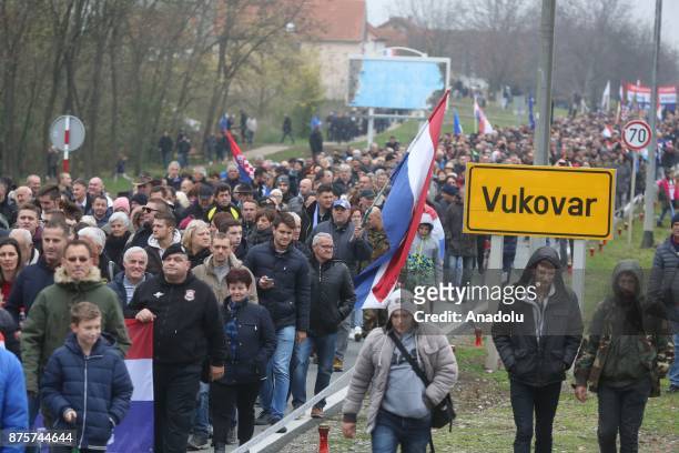 Thousands of people march on the 26th anniversary of the Vukovar massacre in Vukovar, Croatia on November 18, 2017. The Vukovar massacre was the...