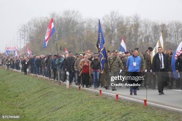 Thousands of people march on the 26th anniversary of the Vukovar massacre in Vukovar, Croatia on November 18, 2017. The Vukovar massacre was the...