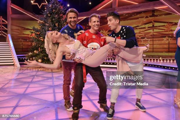 Julia Lindholm with Dirk Ostermann, Florian Flesch and Timo Schulz during the Stefanie Hertel Show 'Die grosse Show der Weihnachtslieder' on November...