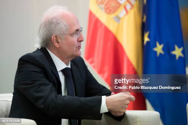 Former mayor of Caracas, Antonio Ledezma meets Spanish Prime Minister Mariano Rajoy at the Moncloa Palace after his arrival by plane from Colombia on...