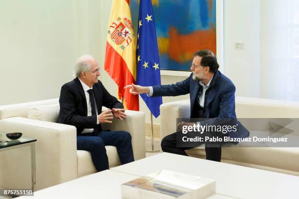 Former mayor of Caracas, Antonio Ledezma meets Spanish Prime Minister Mariano Rajoy at the Moncloa Palace after his arrival by plane from Colombia on...