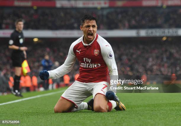 Alexis Sanchez celebrates scoring the 2nd Arsenal goal during the Premier League match between Arsenal and Tottenham Hotspur at Emirates Stadium on...