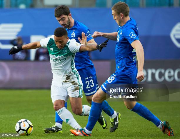 Anton Sosnin and Evgeniy Lutsenko of FC Dinamo Moscow vies for the ball with Ismail Silva of FC Akhmat Grozny during the Russian Premier League match...